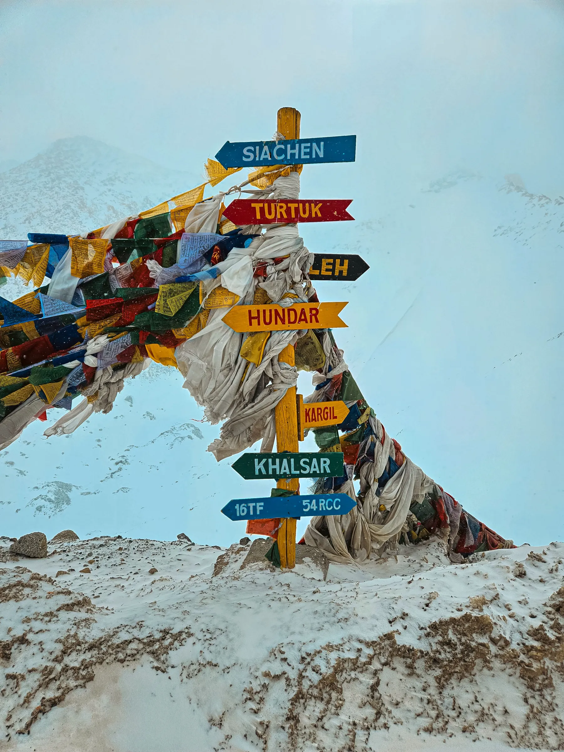 Prayer flags fluttering in the mountain breeze